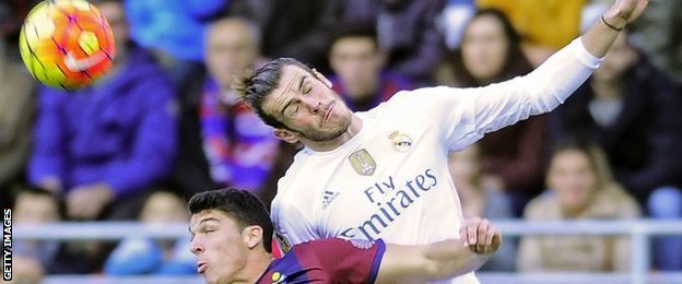 Gareth Bale wins an aerial challenge for Real Madred at Eibar