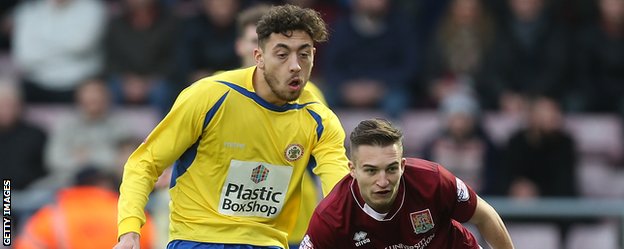 Accrington Stanley utility man Matt Crooks (left) in action against Northampton Town