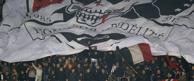 Nice fans unfurl a huge banner during their game with Paris St-Germain