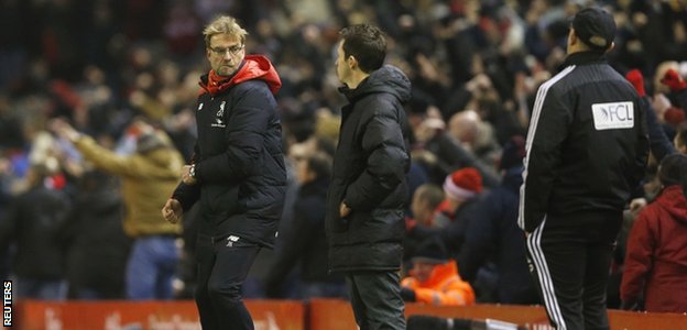 Jurgen Klopp celebrates Origi's goal and then turns towards Tony Pulis