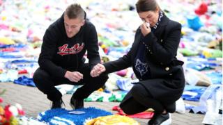 Jamie and Becky Vardy visit memorial