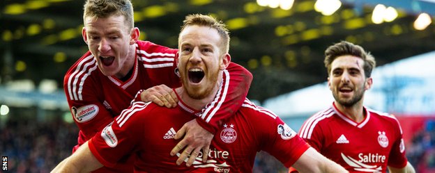 Aberdeen's Jonny Hayes, Adam Rooney and Graeme Shinnie celebrate