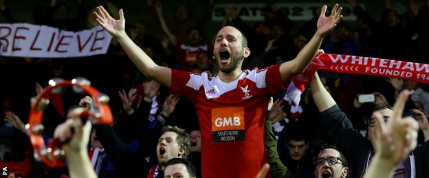 Whitehawk fans celebrate drawing at Dagenham and Redbridge in the FA Cup