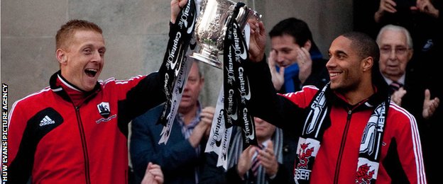 Garry Monk and Ashley Williams with the Capital One Cup in 2013