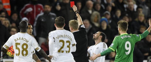 Graham Scott sends off Kyle Naughton